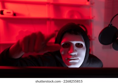 This is the face of a hacker who is knowledgeable with operating systems and other programs. He will exploit flaws and breach the computer system to cause damage.