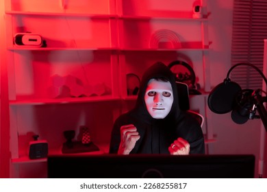 This is the face of a hacker who is knowledgeable with operating systems and other programs. He will exploit flaws and breach the computer system to cause damage.