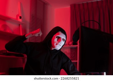 This is the face of a hacker who is knowledgeable with operating systems and other programs. He will exploit flaws and breach the computer system to cause damage.