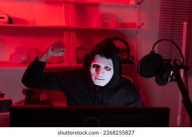 This is the face of a hacker who is knowledgeable with operating systems and other programs. He will exploit flaws and breach the computer system to cause damage.