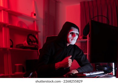 This is the face of a hacker who is knowledgeable with operating systems and other programs. He will exploit flaws and breach the computer system to cause damage.