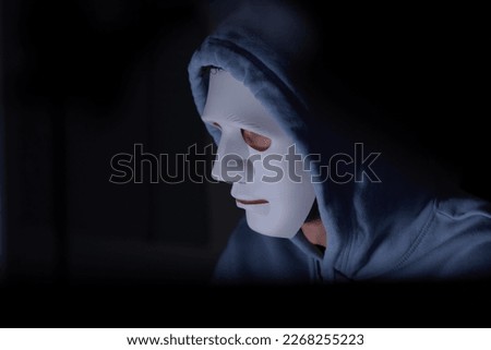 This is the face of a hacker who is knowledgeable with operating systems and other programs. He will exploit flaws and breach the computer system to cause damage.