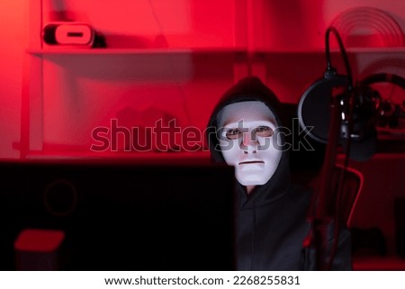 This is the face of a hacker who is knowledgeable with operating systems and other programs. He will exploit flaws and breach the computer system to cause damage.
