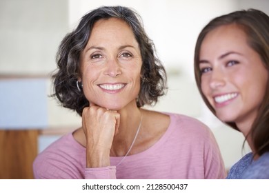 This Family Shared Good Genes. A Mother And Daughter Smiling Happily At The Camera.