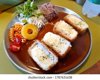 This Food Is Cheese Pork Cutlet.