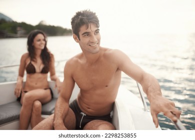 This getaway was exactly what we needed. a young couple enjoying a boat ride on the lake. - Powered by Shutterstock