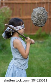 This Is A Girl About To Whack A Wasp Nest Pinata