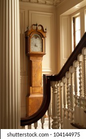 This is a grandfather clock in a historic mansion.
