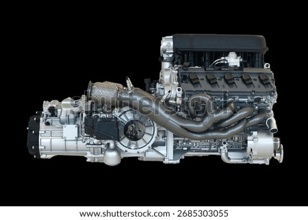 This high-performance V-type engine features a complex exhaust manifold, precision-machined components, and a compact layout, designed for maximum power output