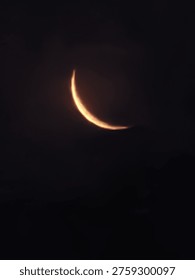 This high-quality visual captures the stunning detail of a Crescent Moon shining brightly against the dark Night Sky. As a beautiful Celestial body, the Crescent Moon represents the peaceful transition of lunar phases. The soft glow from the Crescent Moon illuminates the surrounding Night Sky with a serene, silver light. Observed as a sharp Celestial object, this view showcases the intricate craters and surface of the Crescent Moon clearly. This Celestial imagery is perfect for themes involving the Night Sky, astronomy, or spiritual moments. This sharp Celestial view is a perfect addition to any creative project focused on the Night Sky.