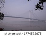 This is the Howrah bridge located in Bengal,India.This bridge is built over the Hugly river in 1943. It links Howrah city with capital city Kolkata.