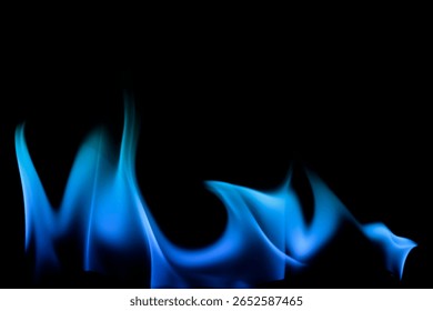 This image captures the elegance of a blue flame dancing against a black background, creating a captivating display of movement and light.