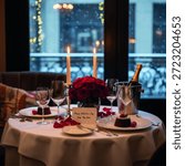 This image captures an intimately set table for a romantic candlelit dinner, perfect for Valentine