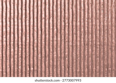 This image captures a reddish-brown corrugated metal surface, highlighting its distinctive vertical ribbed pattern. Excellent for industrial backgrounds or robust design elements.