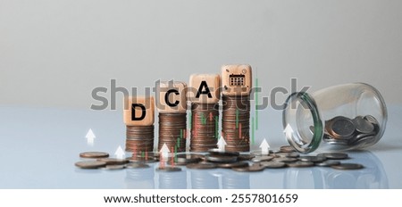 This image depicts a creative representation of dollar cost averaging with stacked coins and finance elements, symbolizing effective investment strategies for wealth accumulation.