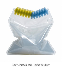 This image features a clear plastic pouch containing two coiled springs, one yellow and one blue, set against a plain white background. The pouch appears flexible and