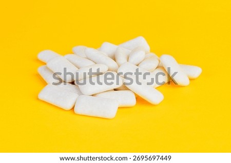 This image features a close-up of several pieces of chewing gum, perfect for illustrating freshness or dental health