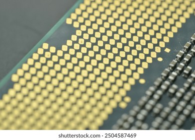 This image features a close-up view of a microprocessor with a grid of gold-plated pins, essential for establishing secure and efficient connections in computing systems.