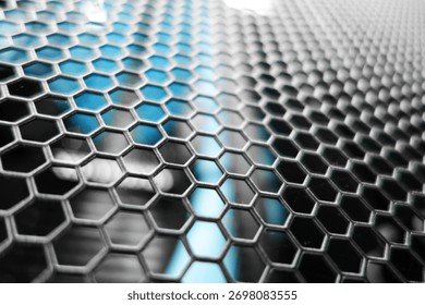 This image features a close-up view of a hexagonal wire mesh pattern, showcasing the intricate geometric design and metallic texture, perfect for industrial themes. - Powered by Shutterstock - Get 15% off with code: PIKWIZARD15