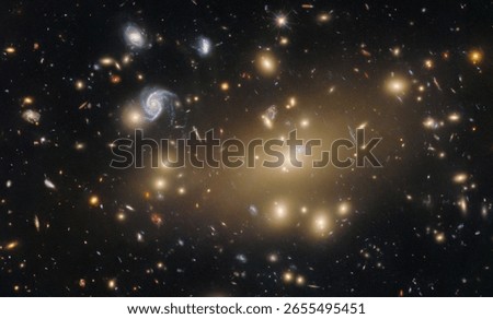   This image features the galaxy cluster Abell 209, captured by the NASA and ESA Hubble Space Telescope. Abell 209 is a massive galaxy cluster located approximately 2.8 billion light-years