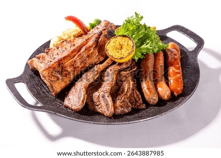 This image features a substantial platter of grilled meats, including ribs and sausages, along with grilled corn, bell peppers, lettuce, and a lemon, presented on a dark griddle.