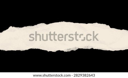 This image features a torn paper edge with a visible texture set against a dark background. The paper appears fragmented and uneven creating a distressed visual element.