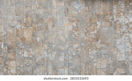 This image features a vertical stone wall cladding with a multi-toned, earthy marble and slate-like pattern in shades of grey, beige, and warm ochre