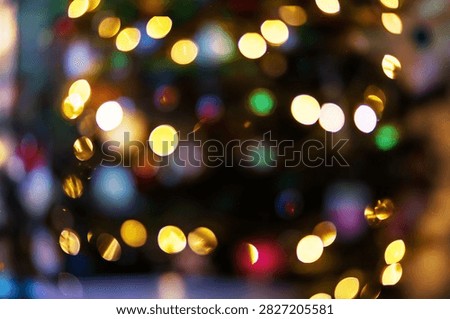 This image features a vibrant abstract bokeh background with colorful outoffocus lights