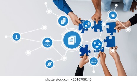 This image illustrates collaborative management strategies through hands assembling puzzle pieces, symbolizing teamwork and problem-solving in modern business contexts. Amity