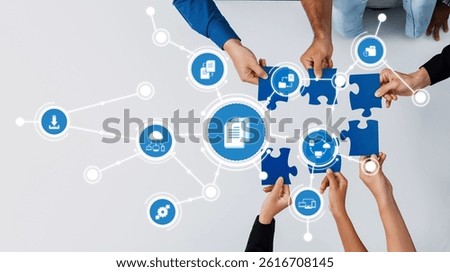 This image illustrates collaborative management strategies through hands assembling puzzle pieces, symbolizing teamwork and problem-solving in modern business contexts. Amity
