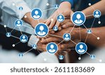 This image illustrates a collaborative networking concept, featuring hands joining together surrounded by symbols of connections, emphasizing professional relationships and teamwork. Amity
