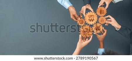 This image illustrates teamwork in management with diverse hands holding gears, symbolizing collaboration, innovation, and strategic success in the business world. Amity