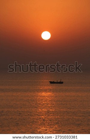 This image was made during my camping to Beyt Dwarka island in India. i was waiting for some object to break pattern of a monotonous sunrise pic I was clicking and I got small boat to make it happen 