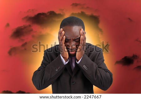 This is an image of a man feeling the heat and pressure, from everyday business.