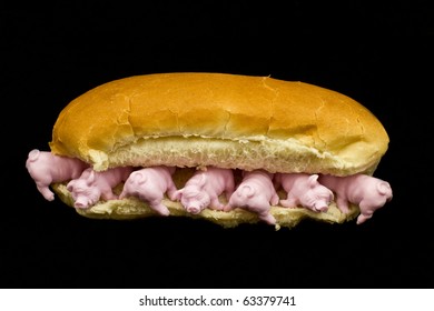 This is an image of an orderve called pig in a blanket.
