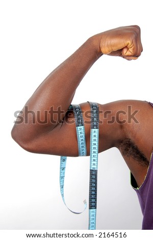 This is an image of a person, contracting his muscles (with measuring tape around the arms).