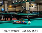 This is an image of a pool table in a pool hall