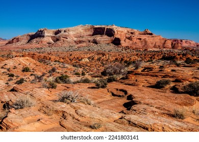 This image portrays the distant desert landscape of The Wave in the North Coyote Buttes area of Arizona-Utah. - Shutterstock ID 2241803141