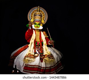 This image is the posture and facial expression of famous indian classical dance kathakali. which is performed at south indian state of kerala.