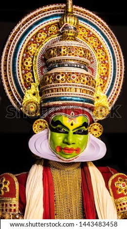 This image is the posture and facial expression of famous indian classical dance kathakali. which is performed at south indian state of kerala.
