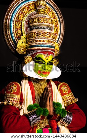 This image is the posture and facial expression of famous indian classical dance kathakali. which is performed at south indian state of kerala.
