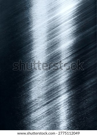 This image presents an abstract and calming view of water in motion, where light reflects softly across the rippling surface. The contrast between the darker tones and the bright streaks creates a flowing pattern that feels both dynamic and serene.

The gentle movement of the water forms natural textures, resembling brush strokes on a canvas. It evokes a sense of tranquility, as if capturing a quiet moment where time slows down and the only motion comes from the rhythm of the water.

This visual composition highlights the beauty of simplicity in nature—where light, shadow, and movement blend harmoniously into a soothing and almost meditative scene.