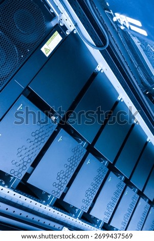 This image showcases advanced server technology within a modern data center, highlighting essential components and the organized layout for optimal performance and efficiency.
