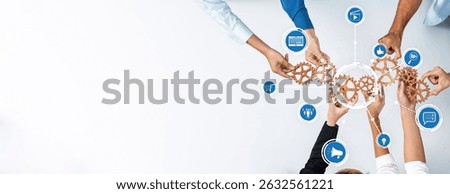 This image showcases a collaborative business environment where hands unite around gears and icons, symbolizing teamwork, strategy, and innovative problem-solving. Amity