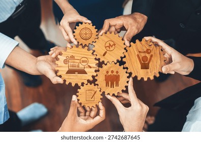 This image showcases a dynamic collaboration theme with wooden gears demonstrating key business strategies including SEO metrics, teamwork, and growth initiatives. Amity