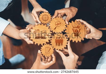 This image showcases a dynamic collaboration theme with wooden gears demonstrating key business strategies including SEO metrics, teamwork, and growth initiatives. Amity