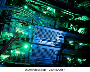 This image showcases green illuminated servers within a dynamic data center environment