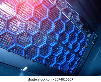 This image showcases a high-performance server with vibrant blue LED lighting, highlighting the advanced technology within a modern data center. Ideal for tech-related projects.