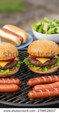 This image showcases a selection of grilled burgers and hot dogs, complemented by a fresh green salad. The composition highlights the food against a soft, blurred background, suggesting an outdoor setting with natural light. The photograph could be used for various commercial projects related to food, cooking, and leisure.