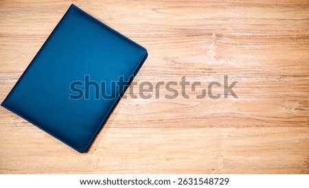 This image showcases a sleek document organizer, suggesting readiness for a formal meeting or presentation.